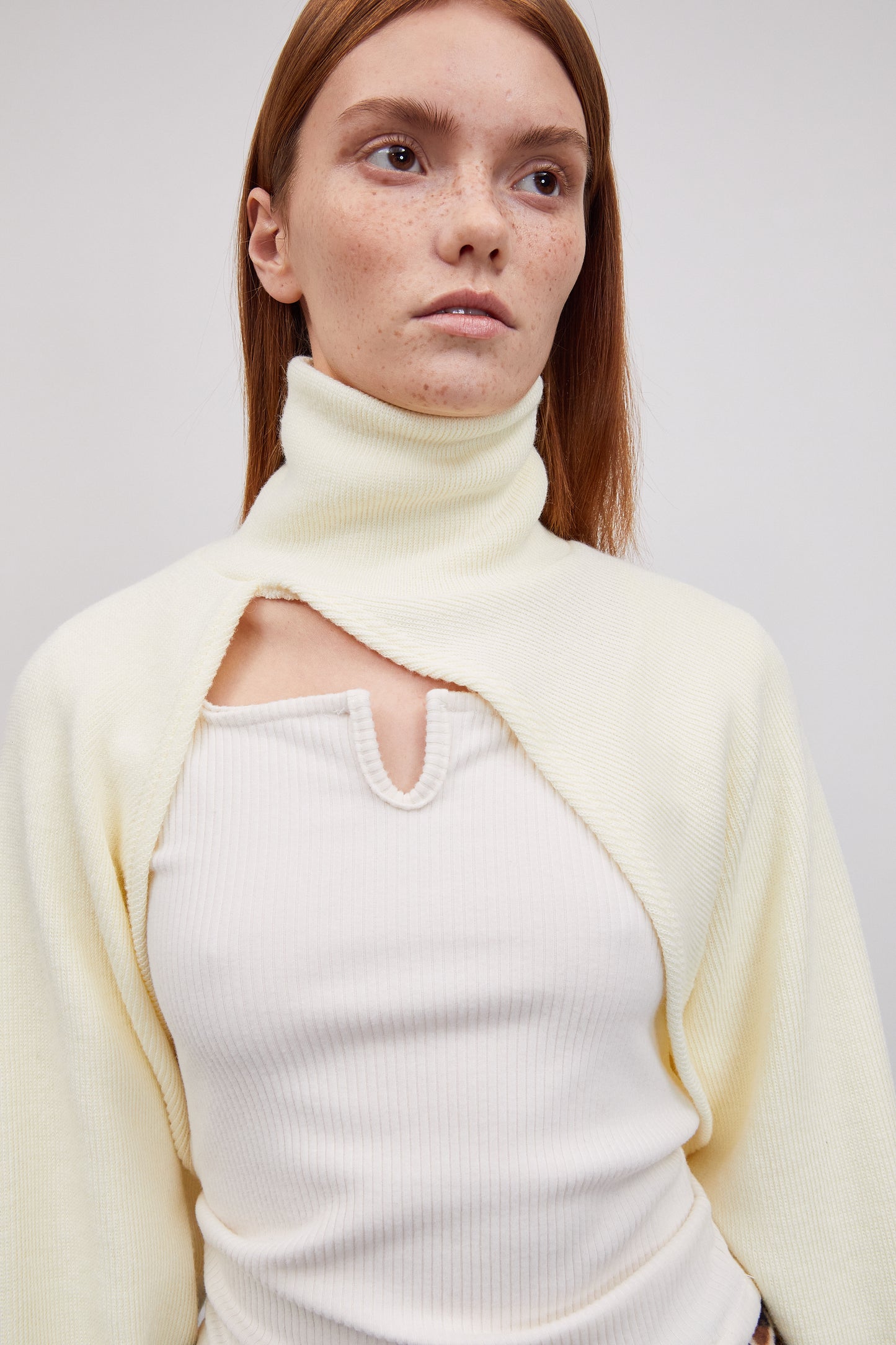 Asymmetric Curved Bolero Turtleneck Rib Knit, Cream Yellow