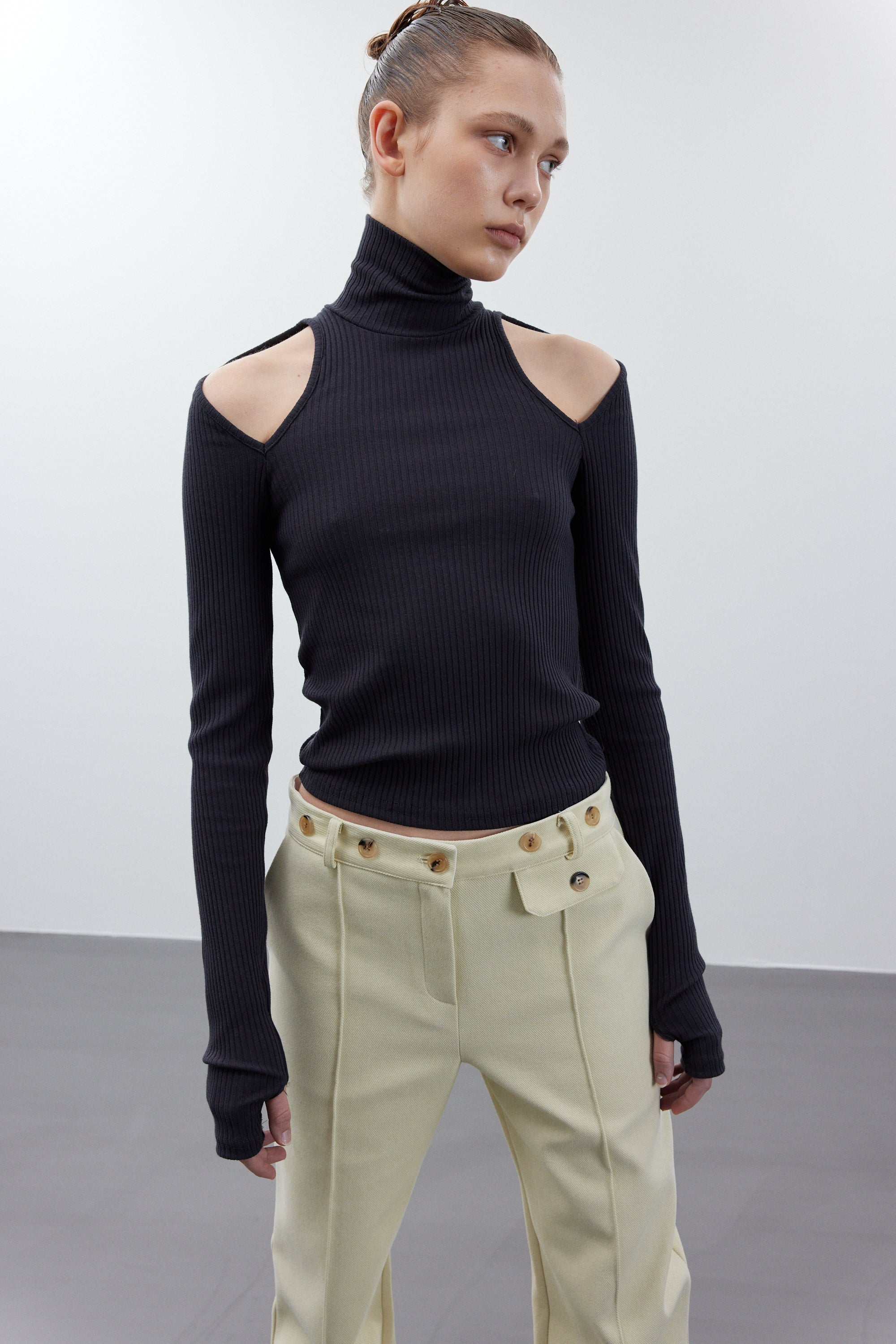 Turtleneck with cutout clearance shoulders